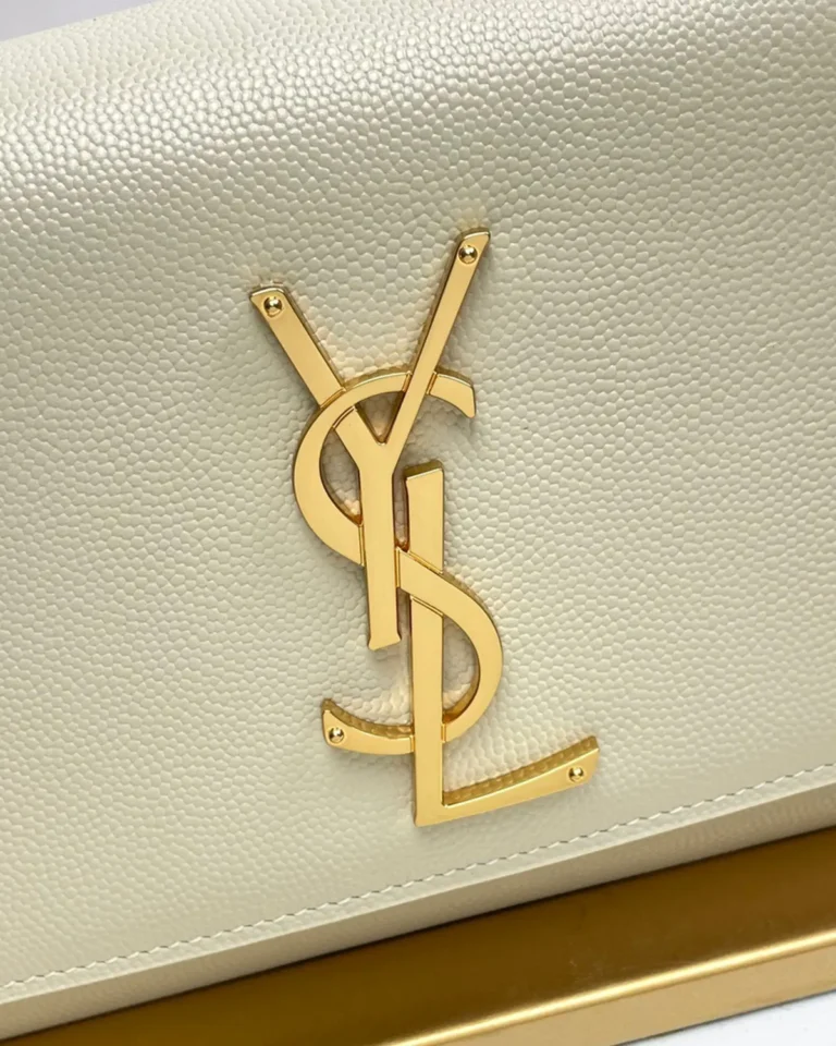 Cream Rectangular Chain Flap Bag — logo detail view