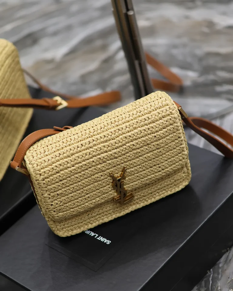 Straw-Tone Woven Flap Bag with Brown Strap — angled front view